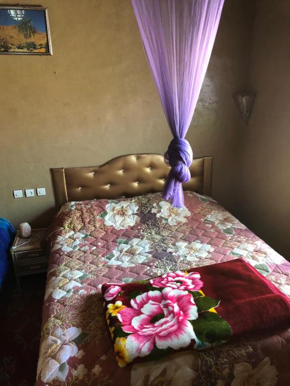 Postel nebo postele na pokoji v ubytování GITE LA GROTTE VALLEE