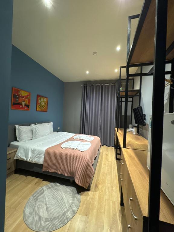 Postel nebo postele na pokoji v ubytování Hotel Tirona