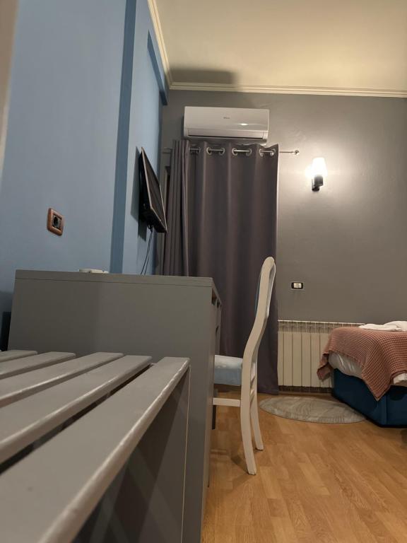 TV a/nebo společenská místnost v ubytování Hotel Tirona