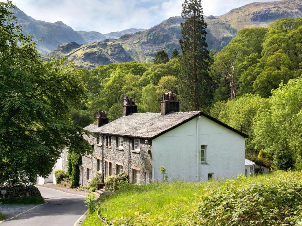 an old house on the side of a road at 2 Bed in Borrowdale SZ068 in Rosthwaite