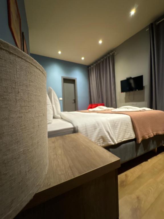 Postel nebo postele na pokoji v ubytování Hotel Tirona