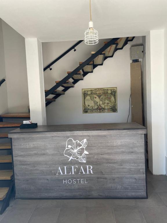 a sign for an air fear hospital in a building at Alfar Hostel in Mar del Plata