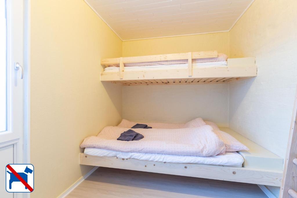 Postel nebo postele na pokoji v ubytování Agger Holidays