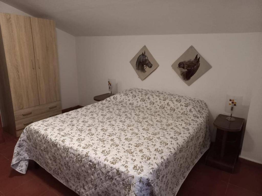 מיטה או מיטות בחדר ב-Valle Salice