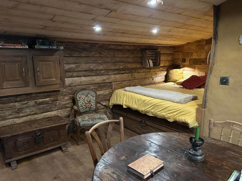 Postel nebo postele na pokoji v ubytování La Grenouillette