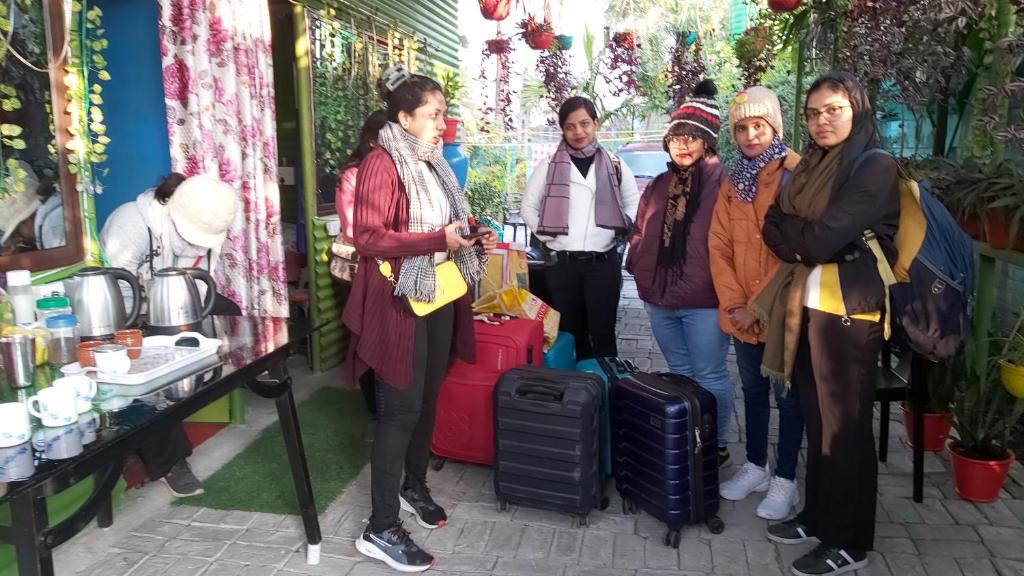 a group of women standing in front of a store at GREEN VIEW HOME STAY in Siliguri