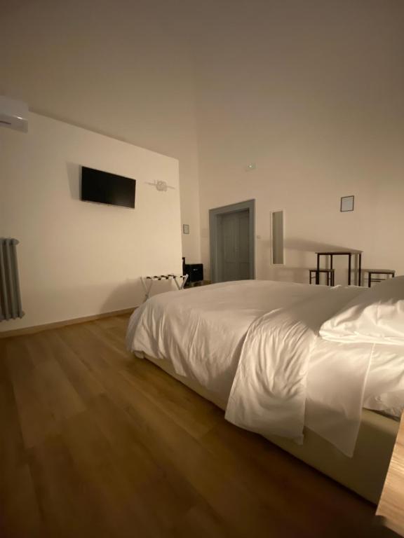 Postel nebo postele na pokoji v ubytování Le Stanze Di Ambra