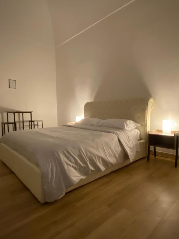 Postel nebo postele na pokoji v ubytování Le Stanze Di Ambra