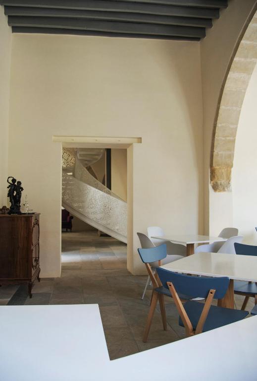 Postel nebo postele na pokoji v ubytování Lokàl Boutique Hotel