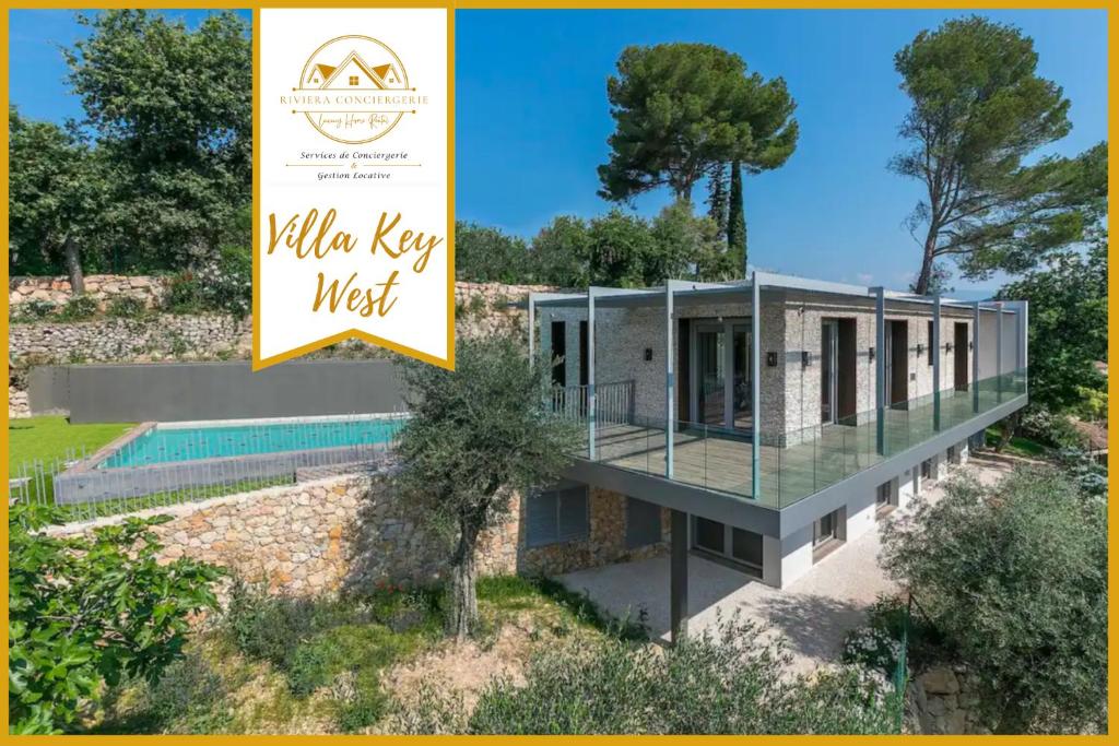uma villa a oeste com uma piscina e uma casa em Villa KEY WEST & Unique & Piscine & Vue Mer & Clim em Mougins