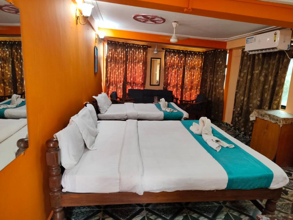 Postel nebo postele na pokoji v ubytování Neev Beach View Goa