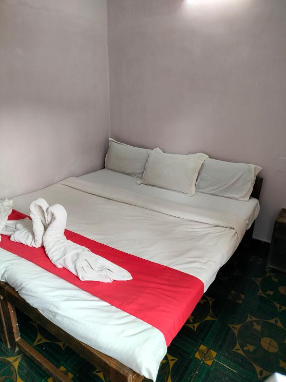 Postel nebo postele na pokoji v ubytování Neev Beach View Goa