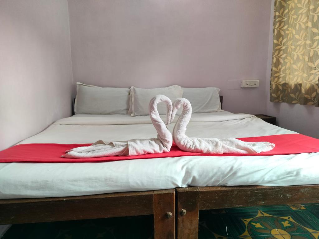Postel nebo postele na pokoji v ubytování Neev Beach View Goa