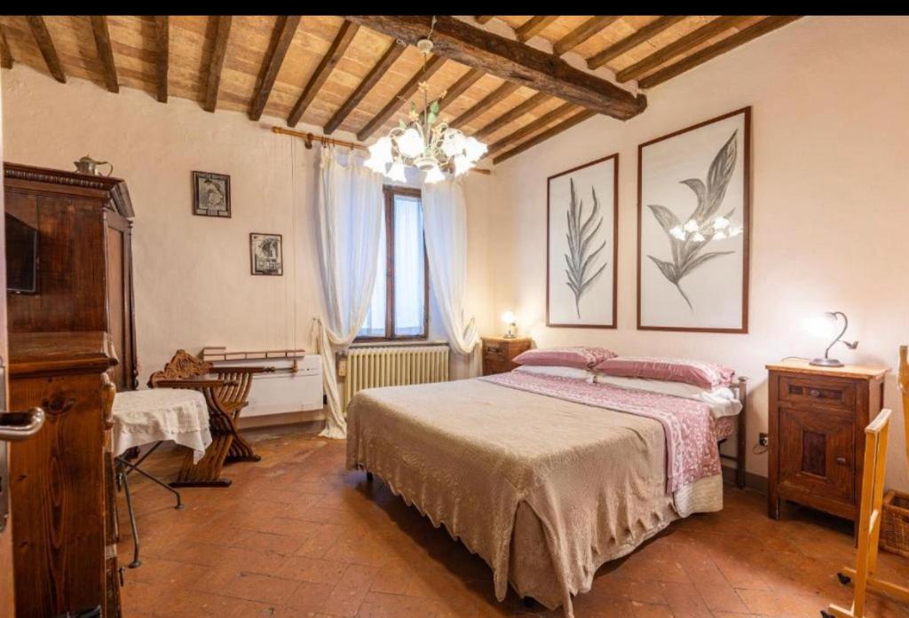 Postelja oz. postelje v sobi nastanitve Guesthouse da Idolina dal 1946