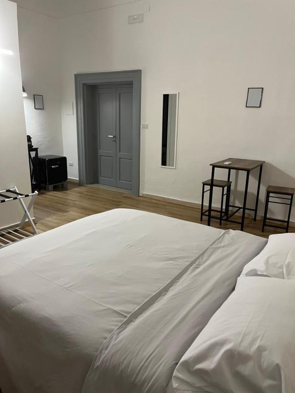 Postel nebo postele na pokoji v ubytování Le Stanze Di Ambra