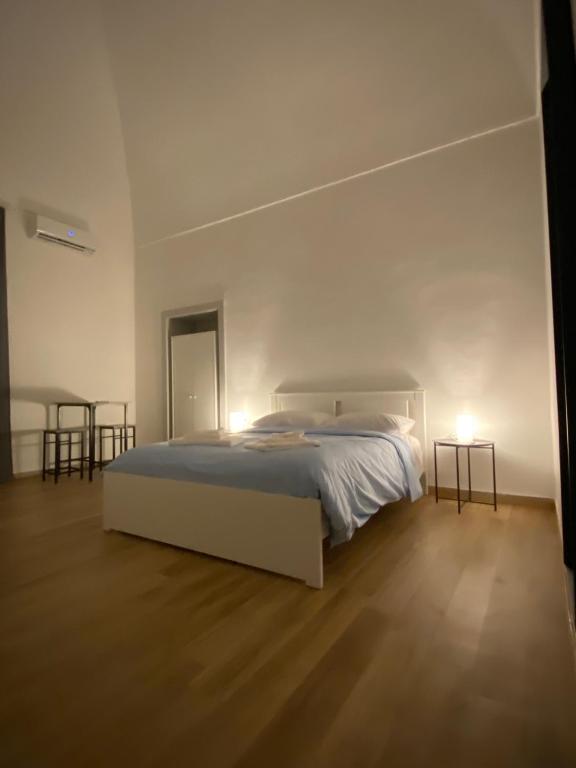 Postel nebo postele na pokoji v ubytování Le Stanze Di Ambra
