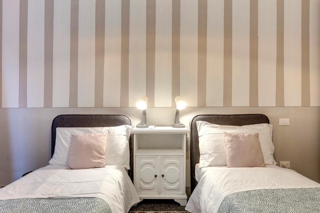 A bed or beds in a room at Proconsolo 9S