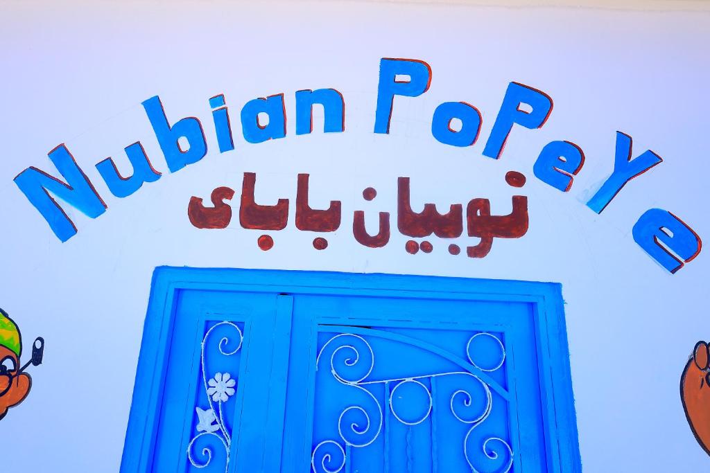 Certifikát, hodnocení, plakát nebo jiný dokument vystavený v ubytování Nubian Popeye - Roof top - Nile View