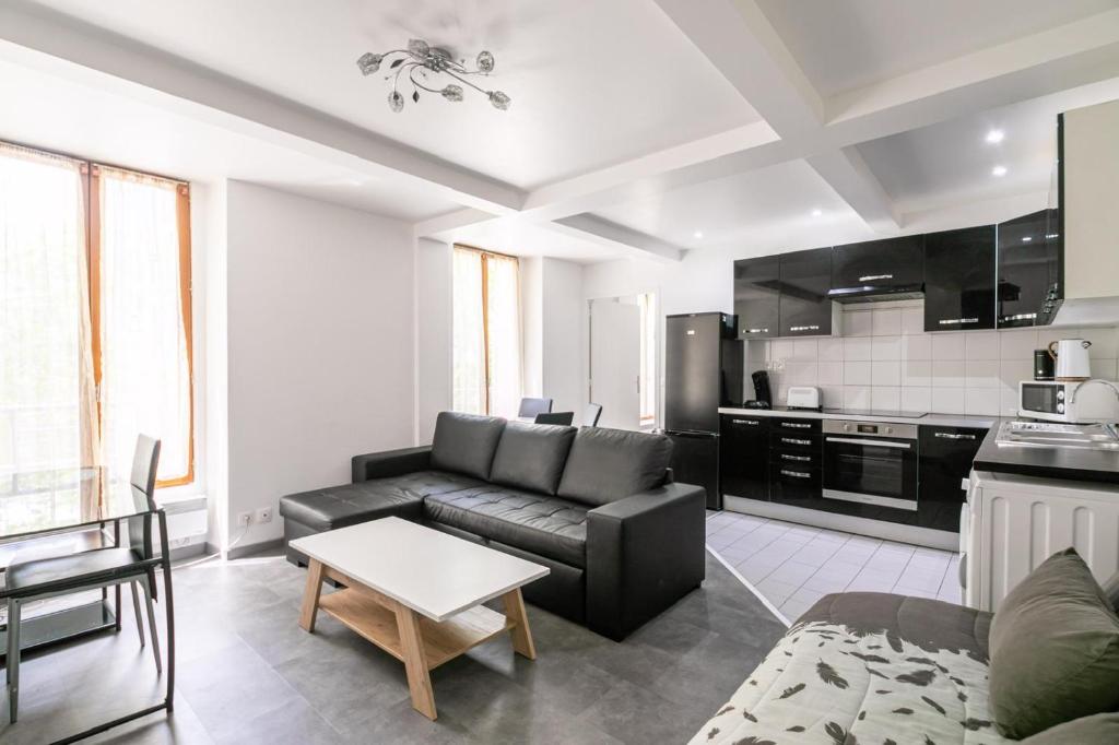 Ruang duduk di Appartement Montparnasse