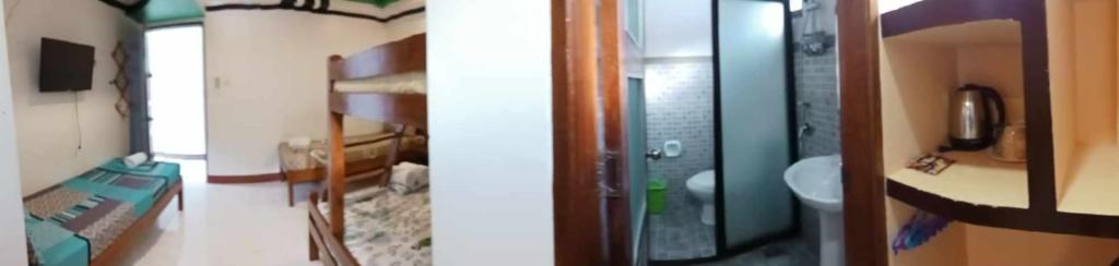 TV a/nebo společenská místnost v ubytování Vali-Joe Travel Lodge