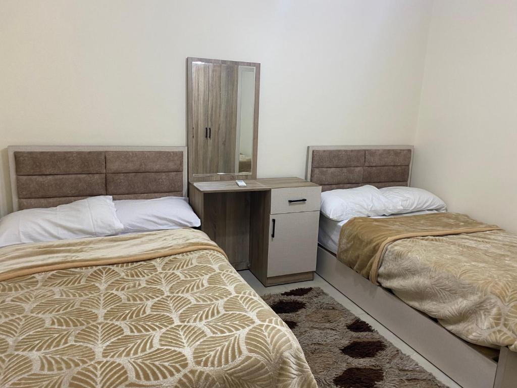 Postel nebo postele na pokoji v ubytování City Stars Apt2