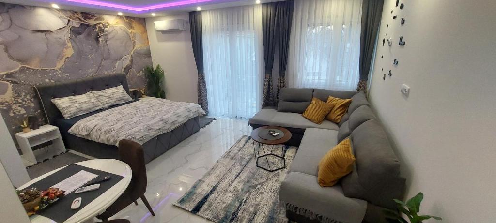 Postel nebo postele na pokoji v ubytování GOLD APARTMANI