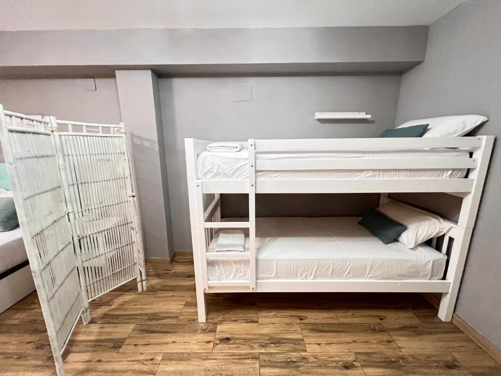 Posteľ alebo postele v izbe v ubytovaní Nuestra Casita de Marmoles Parking Incluido 2 bicis gratis