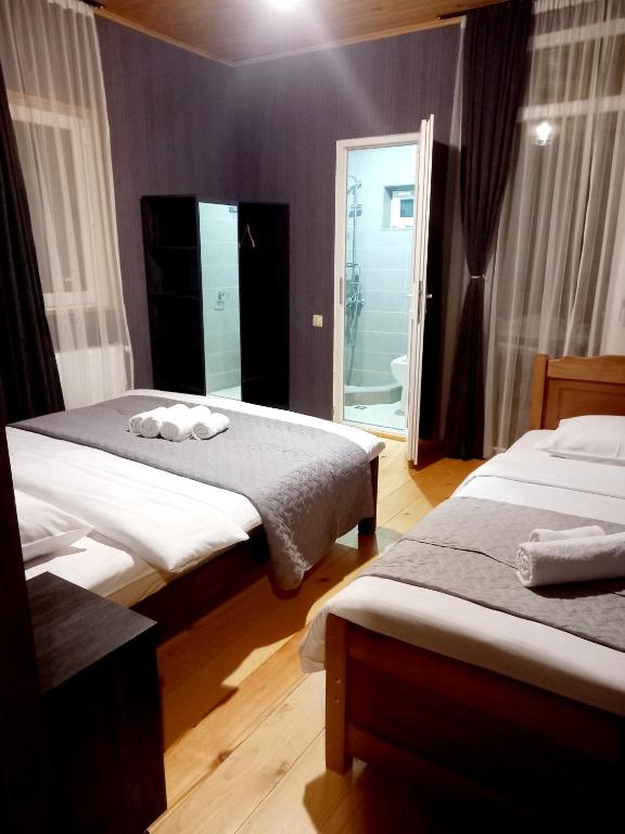 Postel nebo postele na pokoji v ubytování STOP HOUSE Mestia