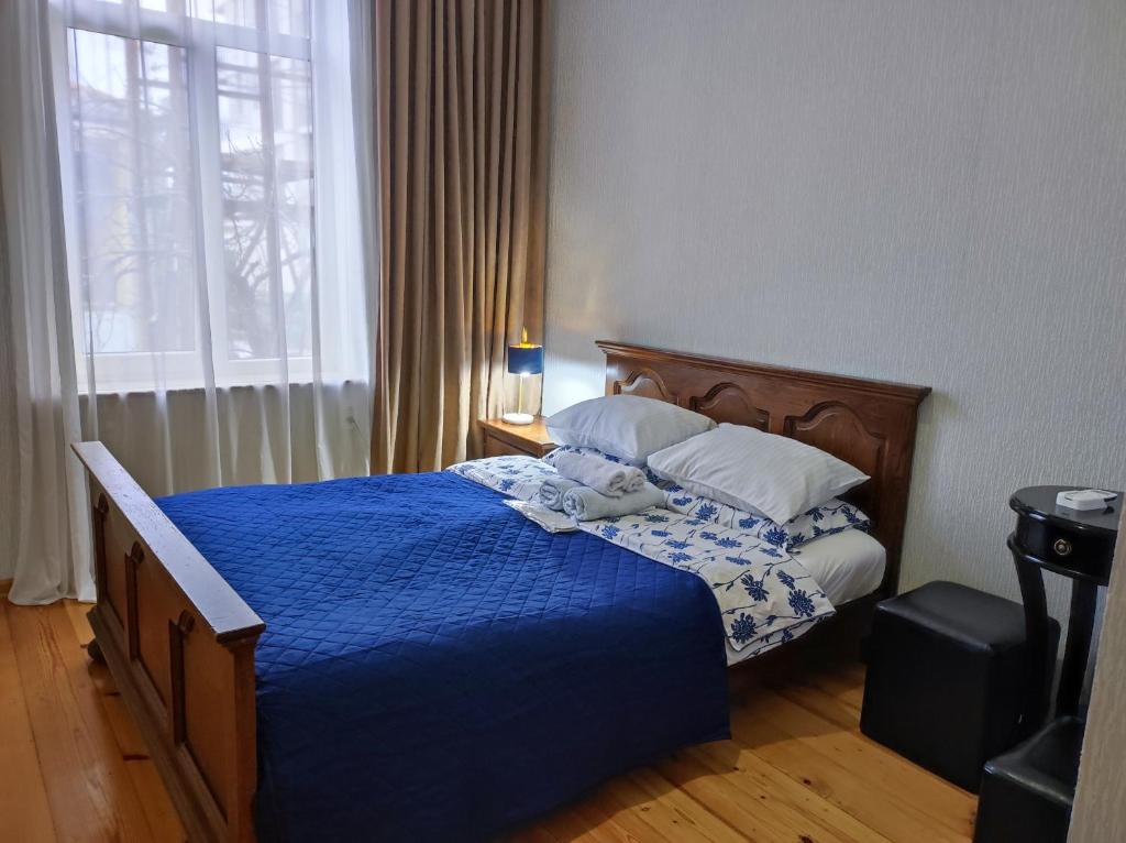 Llit o llits en una habitació de Friendly Guest House