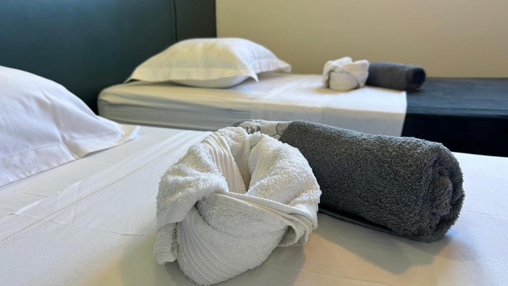 Postel nebo postele na pokoji v ubytování La villa Jalna Grenadine deux chambres et piscine privée
