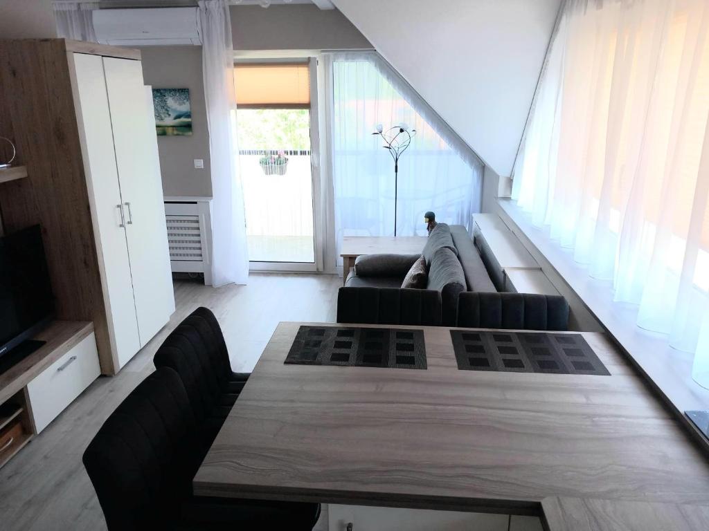 A kitchen or kitchenette at Prime Apartment Heviz