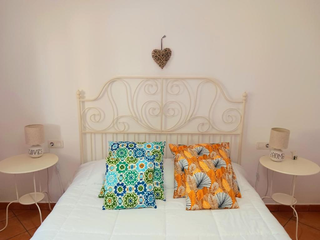 Кровать или кровати в номере Casa Yahshua