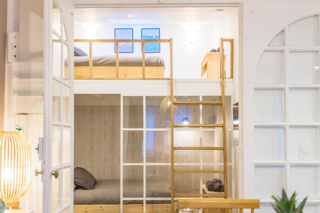 Postel nebo postele na pokoji v ubytování Joyful tiny house seaside