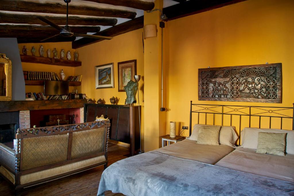 A bed or beds in a room at Finca Heredad La Boquilla