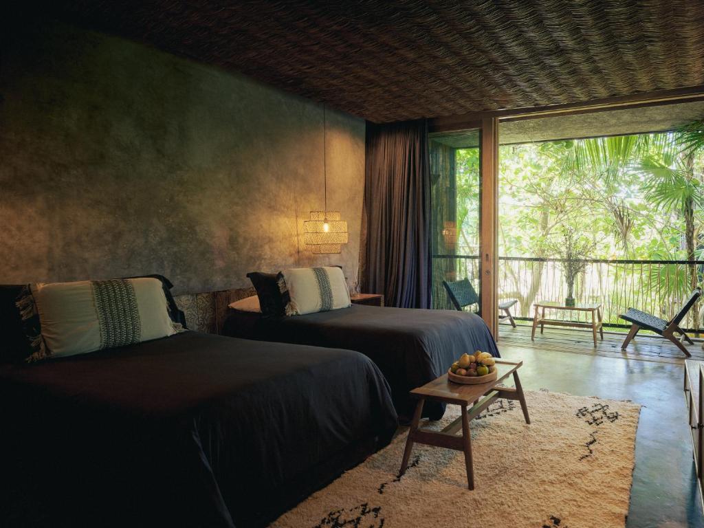 Postel nebo postele na pokoji v ubytování Be Tulum Beach & Spa Resort