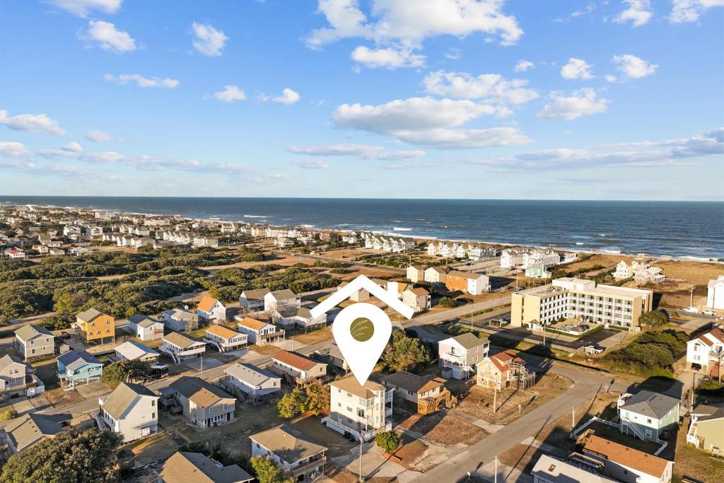 an aerial view of a city with the ocean at 5310 - Wright by the Beach in Kill Devil Hills