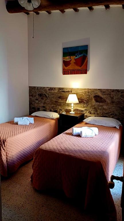 Postel nebo postele na pokoji v ubytování Posada San Gabriel