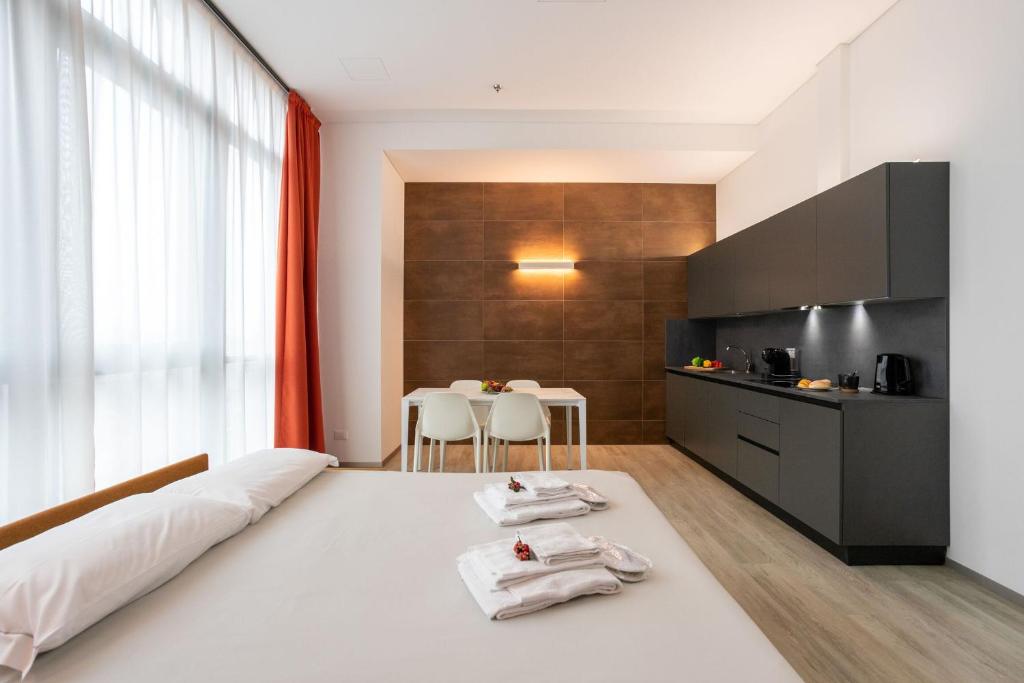 Łóżko lub łóżka w pokoju w obiekcie HTM Venice Suite by Halldis