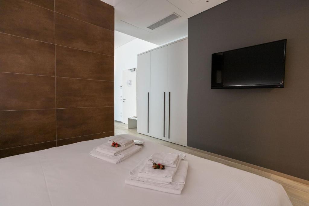 Telewizja i/lub zestaw kina domowego w obiekcie HTM Venice Suite by Halldis
