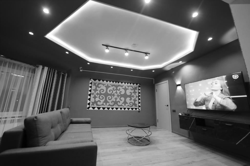 TV a/nebo společenská místnost v ubytování Cozy Hostel