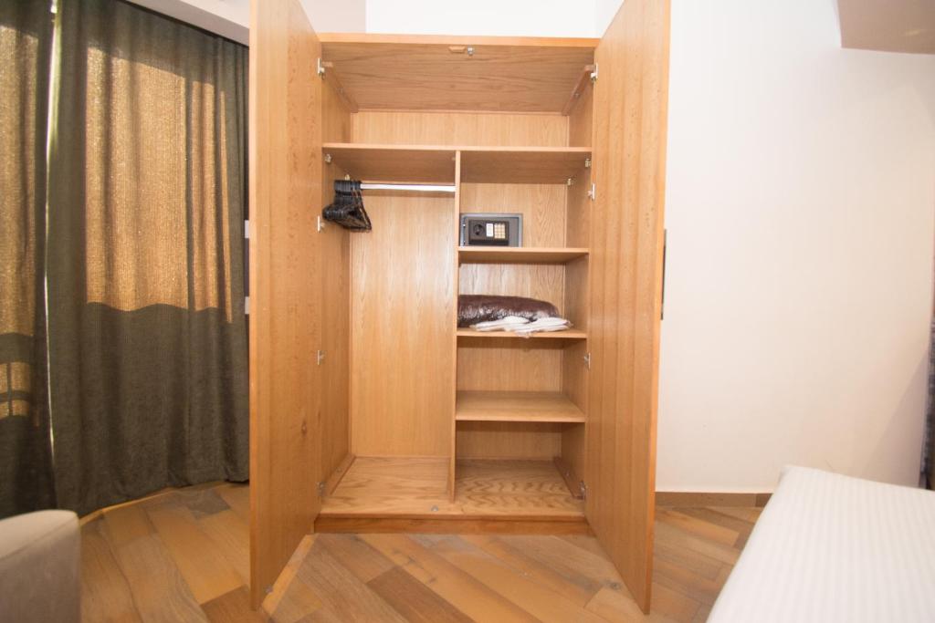 Postel nebo postele na pokoji v ubytování Nile Guardian Hotel