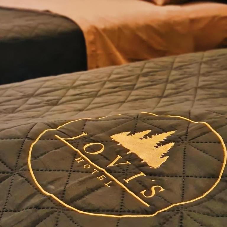 Postel nebo postele na pokoji v ubytování Jovis Hotel - Lujo Cultural