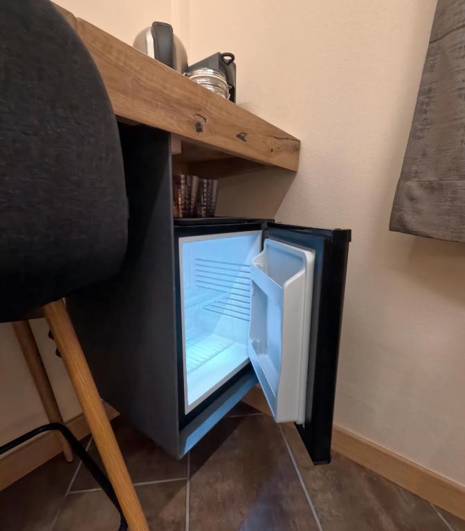Kuchyň nebo kuchyňský kout v ubytování Lucalì Mountain Room