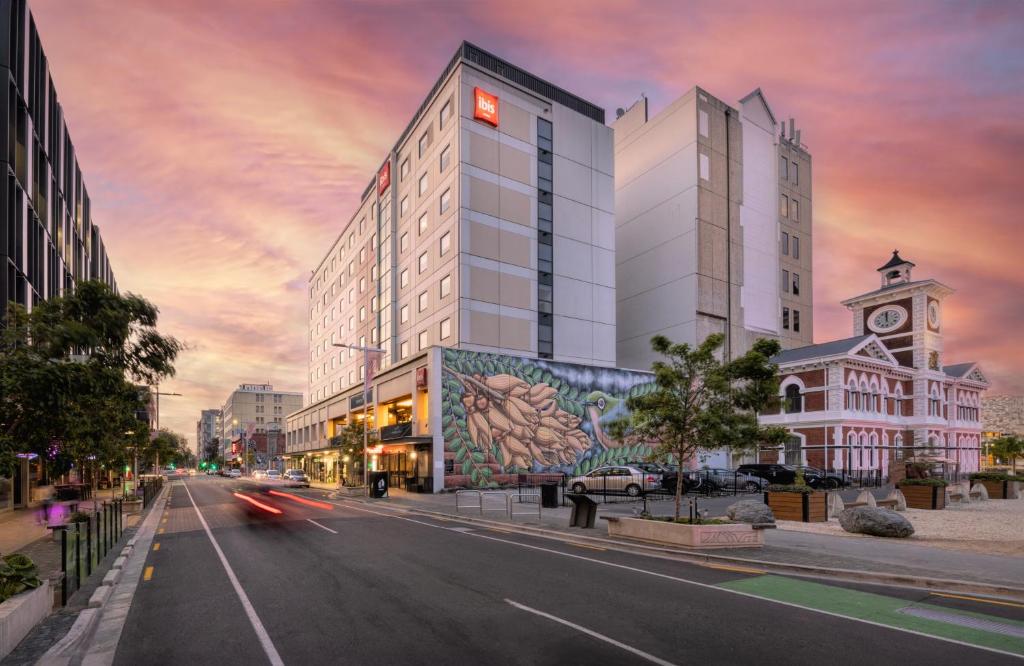a rendering of a building on a city street at Ibis Christchurch in Christchurch