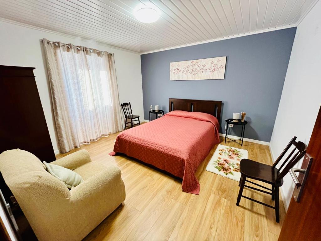 Ένα ή περισσότερα κρεβάτια σε δωμάτιο στο Casa das Courelas