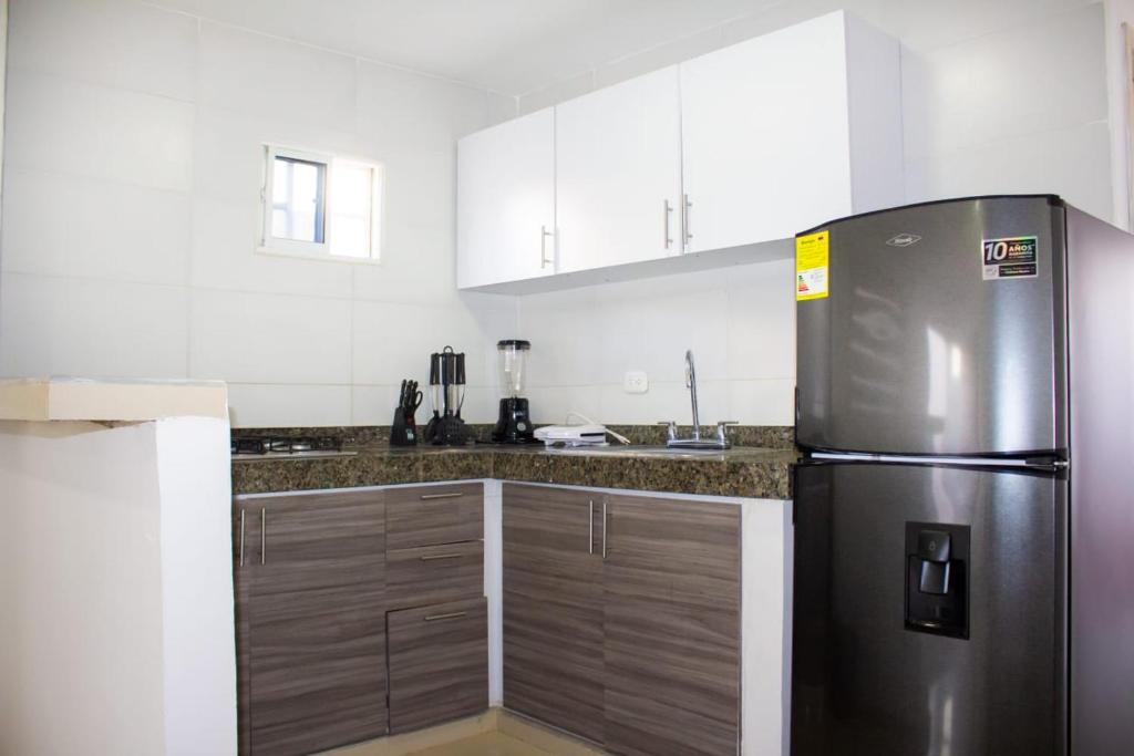 Kuchyň nebo kuchyňský kout v ubytování Apartamento en Valledupar - Casa Canaán