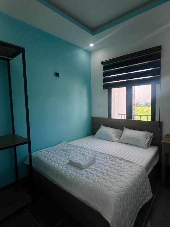 Postel nebo postele na pokoji v ubytování Ruby Motel Bà Rịa