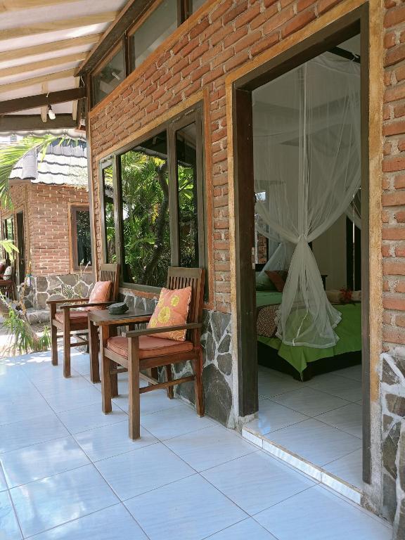 Patio nebo venkovní prostory v ubytování Gili Hideaway