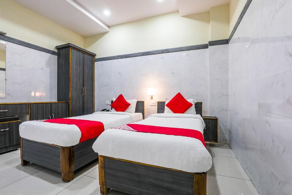 Postel nebo postele na pokoji v ubytování Super Hotel O Src Grand