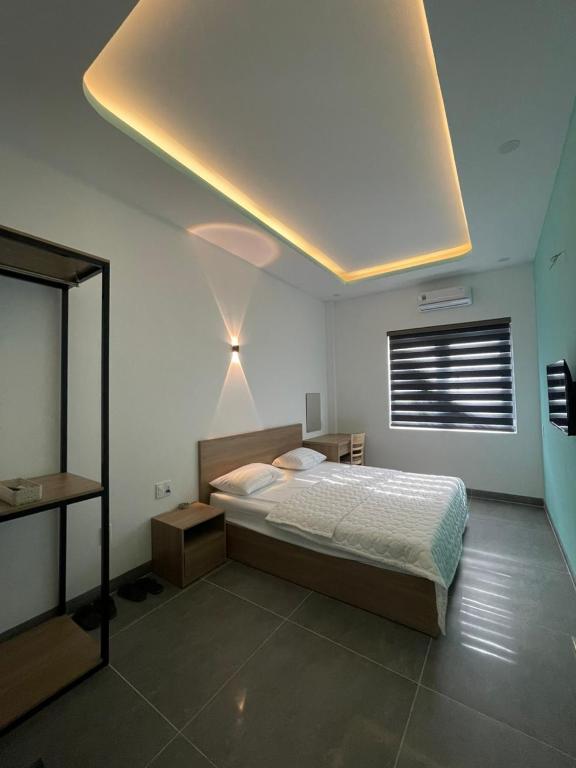 Postel nebo postele na pokoji v ubytování Ruby Motel Bà Rịa